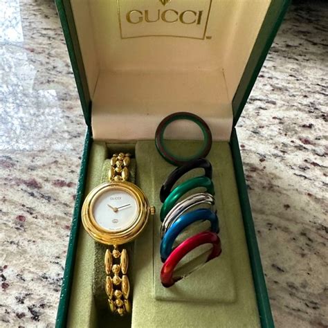 vintage gucci watch with interchangeable bezels